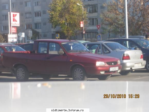 poze dacia camioneta cealalta king cab parcare niste mici